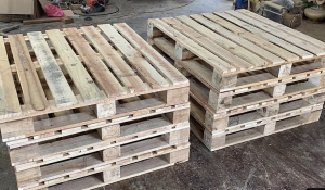 Can a wood finish be applied over stained wood?