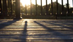 Step-by-step guide for designing and constructing a durable wooden patio deck.