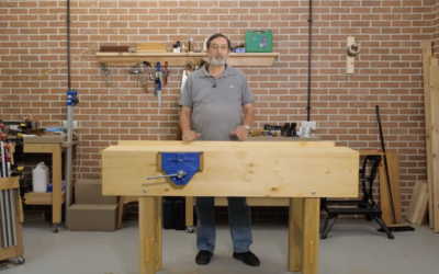 What type of workbench does Paul Sellers advocate for in his videos?